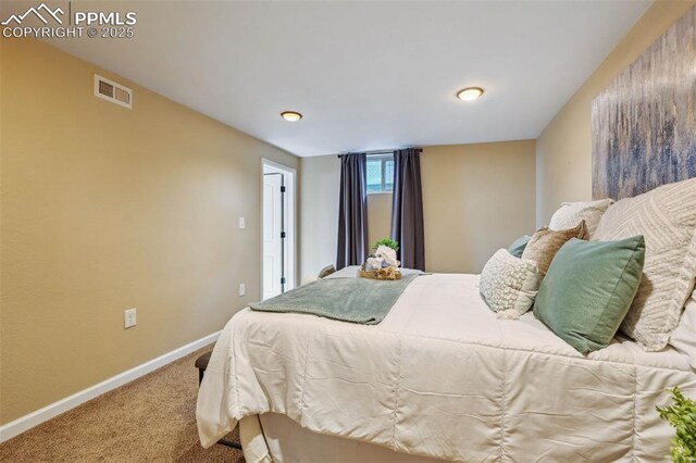 107 N Logan Ave, Colorado Springs, CO 80909 - bedroom featuring carpet and baseboards