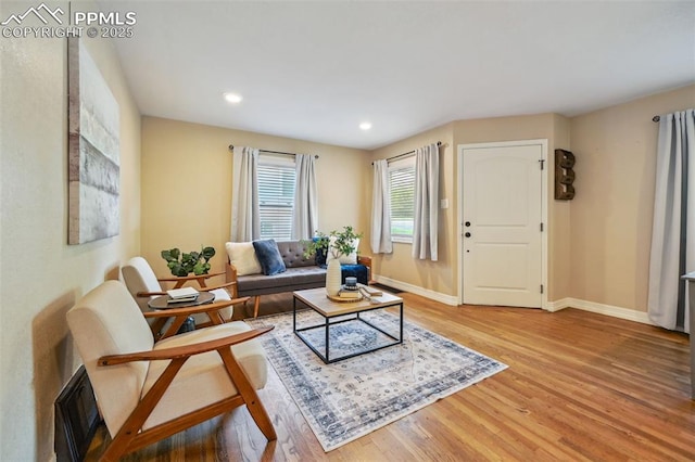 107 N Logan Ave, Colorado Springs, CO 80909 - living room featuring wood finished floors, baseboards, and recessed lighting