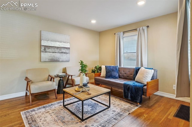 107 N Logan Ave, Colorado Springs, CO 80909 - living room with baseboards, wood finished floors, and recessed lighting