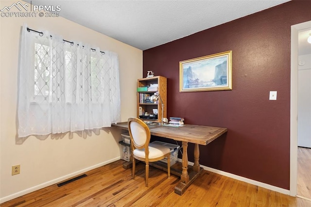 4534 Bella Dr, Colorado Springs, CO 80918 - office featuring wood finished floors and baseboards