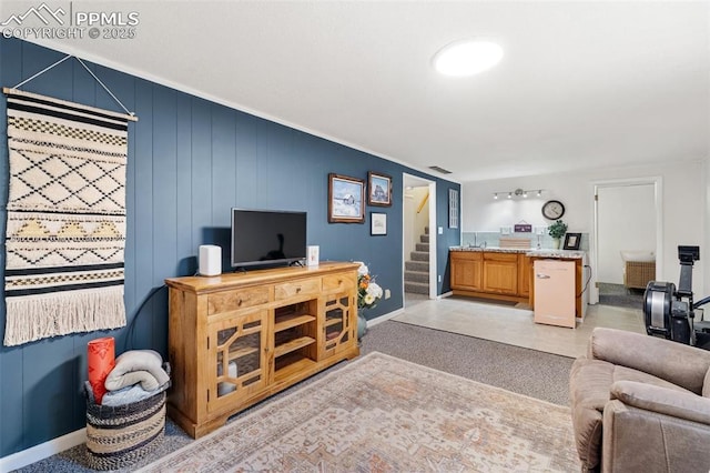 4534 Bella Dr, Colorado Springs, CO 80918 - living room featuring stairs and baseboards