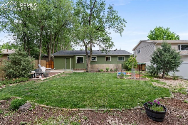 4534 Bella Dr, Colorado Springs, CO 80918 - rear view of house featuring a patio area