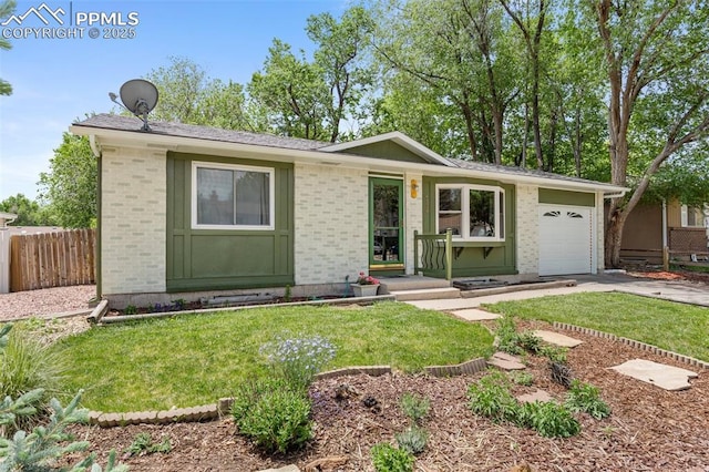 4534 Bella Dr, Colorado Springs, CO 80918 - single story home featuring brick siding, a garage, and driveway