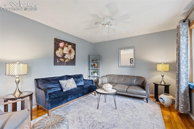 4534 Bella Dr, Colorado Springs, CO 80918 - living room with wood finished floors, a ceiling fan, and baseboards