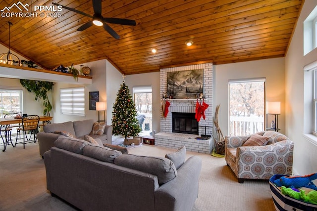 105 Pauma Valley Dr, Colorado Springs, CO 80921 - carpeted living area with wood ceiling, ceiling fan, plenty of natural light, vaulted ceiling, and a brick fireplace