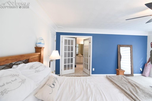 105 Pauma Valley Dr, Colorado Springs, CO 80921 - bedroom with baseboards, french doors, ornamental molding, ensuite bath, and ceiling fan