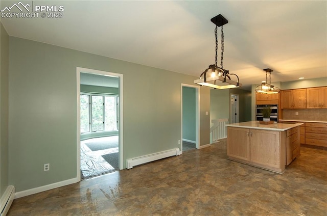 16070 Buggywhip Dr, Elbert, CO 80106 - kitchen with baseboard heating, baseboards, and light countertops