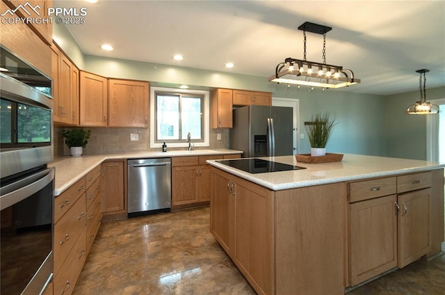 16070 Buggywhip Dr, Elbert, CO 80106 - kitchen with appliances with stainless steel finishes, a sink, backsplash, light countertops, and recessed lighting