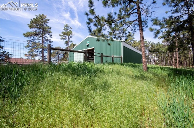 16070 Buggywhip Dr, Elbert, CO 80106 - view of yard featuring an outbuilding