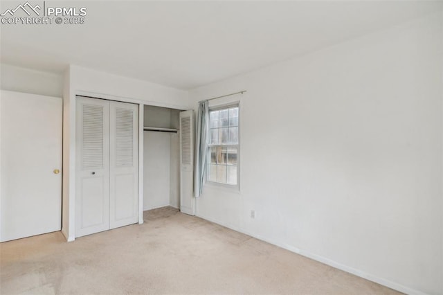 119 Arlen St, Colorado Springs, CO 80909 - unfurnished bedroom featuring carpet, a closet, and baseboards