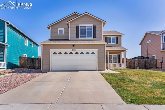 5142 Goldking Rd, Pueblo, CO 81008 - traditional-style house with a garage and driveway