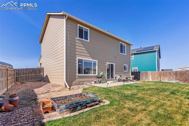 5142 Goldking Rd, Pueblo, CO 81008 - rear view of house with a patio and a garden