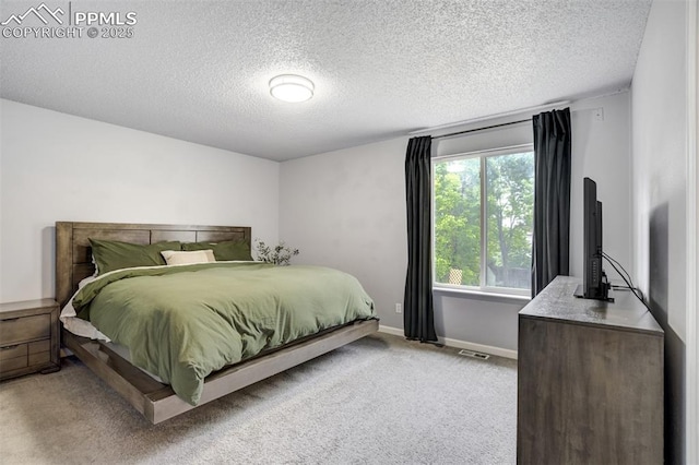 13072 Westlake Pl, Broomfield, CO 80020 - bedroom featuring light carpet, baseboards, and a textured ceiling