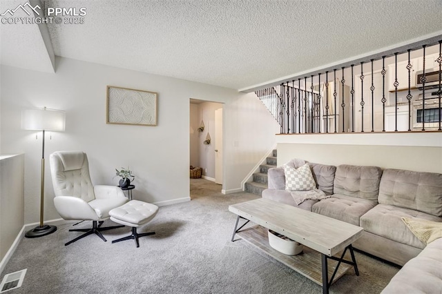 13072 Westlake Pl, Broomfield, CO 80020 - living room with carpet floors, a textured ceiling, baseboards, and stairway