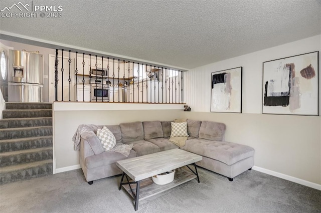 13072 Westlake Pl, Broomfield, CO 80020 - living area featuring a textured ceiling, stairs, carpet, and baseboards