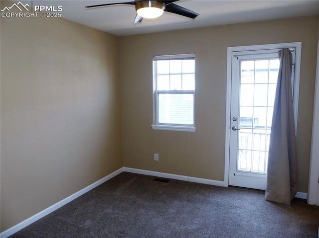 828 S Wahsatch Ave, Colorado Springs, CO 80903 - empty room featuring a ceiling fan, dark carpet, and baseboards