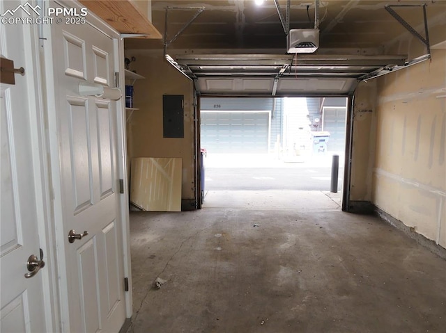 828 S Wahsatch Ave, Colorado Springs, CO 80903 - garage featuring electric panel and a garage door opener