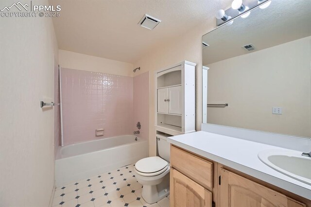 5437 Lions Gate Ln, Colorado Springs, CO 80919 - full bath with vanity, tile patterned floors, and shower / bath combination