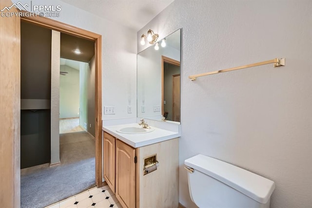 5437 Lions Gate Ln, Colorado Springs, CO 80919 - half bath featuring vanity and tile patterned floors