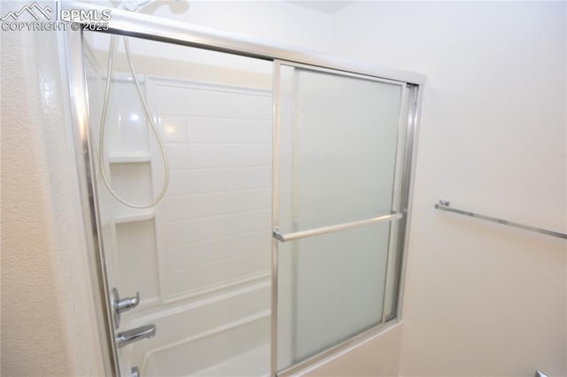 1310-1312 Market St, Colorado Springs, CO 80904 - bathroom with bath / shower combo with glass door