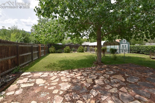 1310-1312 Market St, Colorado Springs, CO 80904 - fenced backyard featuring a detached carport, a patio, and a shed