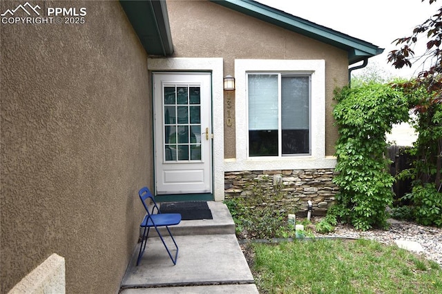 1310-1312 Market St, Colorado Springs, CO 80904 - doorway to property with stucco siding and stone siding