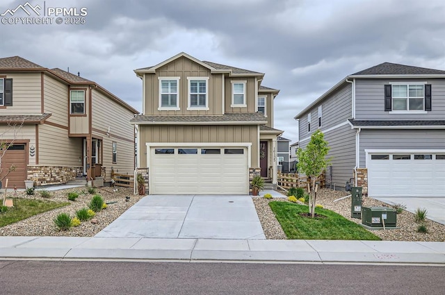 16135 Mountain Flax Dr, Monument, CO 80132 - craftsman-style house with board and batten siding, stone siding, driveway, and a garage