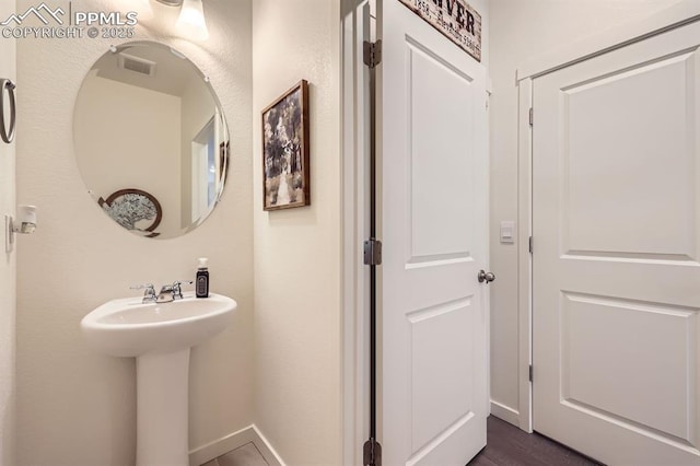 16135 Mountain Flax Dr, Monument, CO 80132 - bathroom featuring baseboards