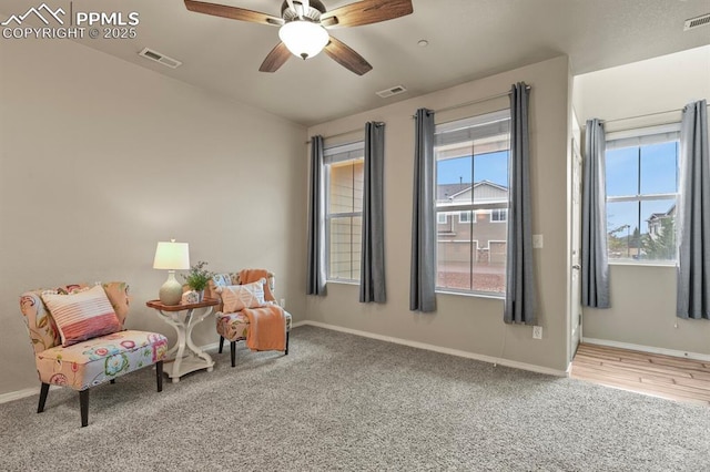 2540 Shannara Grv, Colorado Springs, CO 80951 - sitting room featuring carpet floors, a ceiling fan, and baseboards