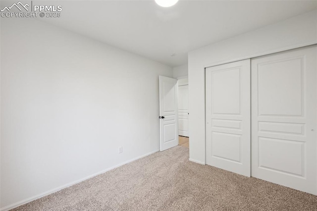 4530 Star Ridge Dr, Colorado Springs, CO 80916 - unfurnished bedroom with carpet flooring, baseboards, and a closet