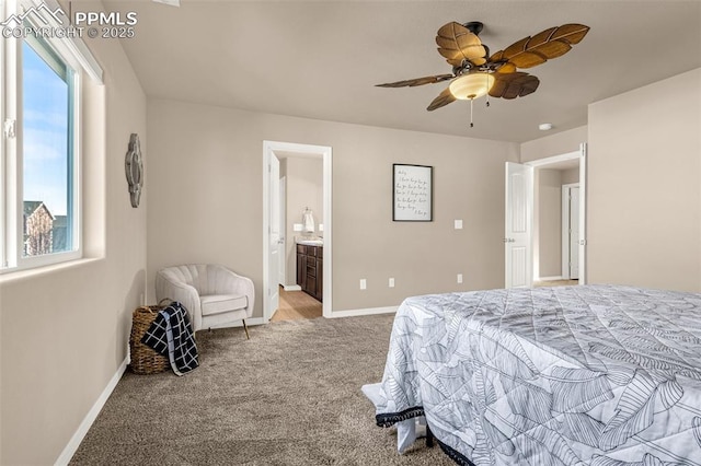 10881 Traders Pkwy, Fountain, CO 80817 - bedroom featuring carpet flooring, baseboards, ensuite bathroom, and a ceiling fan