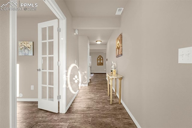 10881 Traders Pkwy, Fountain, CO 80817 - corridor featuring dark wood-style floors and baseboards