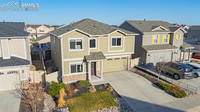 10881 Traders Pkwy, Fountain, CO 80817 - view of front facade featuring driveway, an attached garage, a residential view, and roof with shingles