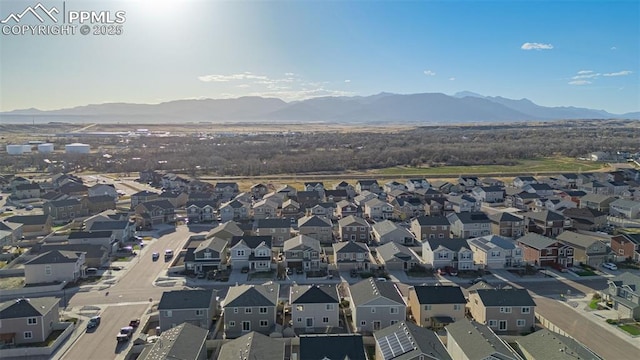 10881 Traders Pkwy, Fountain, CO 80817 - aerial view of property and surrounding area featuring a mountainous background and nearby suburban area