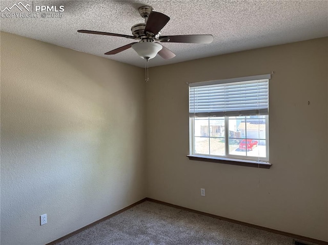 851 Legend Oak Dr, Fountain, CO 80817 - carpeted spare room featuring a ceiling fan and a textured ceiling