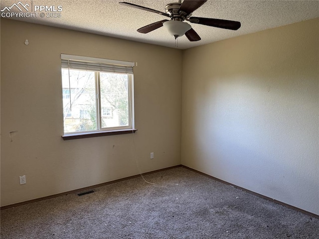 851 Legend Oak Dr, Fountain, CO 80817 - empty room featuring carpet floors, a ceiling fan, and a textured ceiling