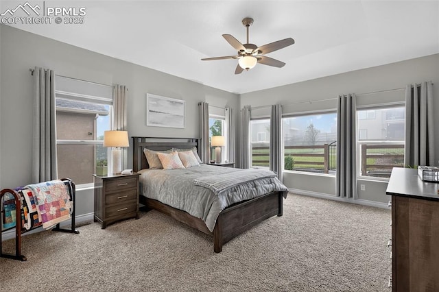 9661 Fresh Air Dr, Colorado Springs, CO 80924 - bedroom featuring light carpet, baseboards, and ceiling fan