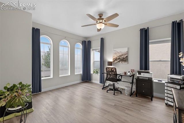 9661 Fresh Air Dr, Colorado Springs, CO 80924 - office area with ceiling fan, light wood-type flooring, and baseboards