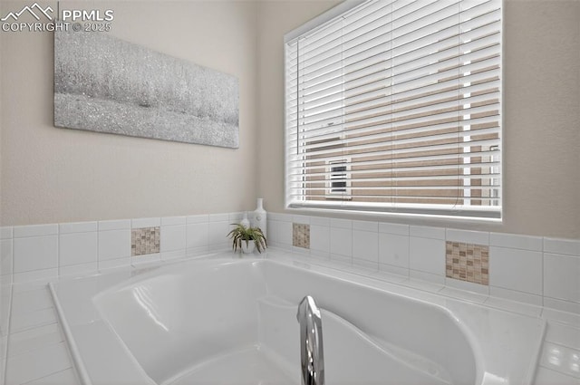 9661 Fresh Air Dr, Colorado Springs, CO 80924 - bathroom with healthy amount of natural light and a garden tub