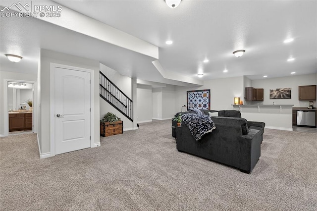 9661 Fresh Air Dr, Colorado Springs, CO 80924 - carpeted living area featuring baseboards, stairway, and recessed lighting