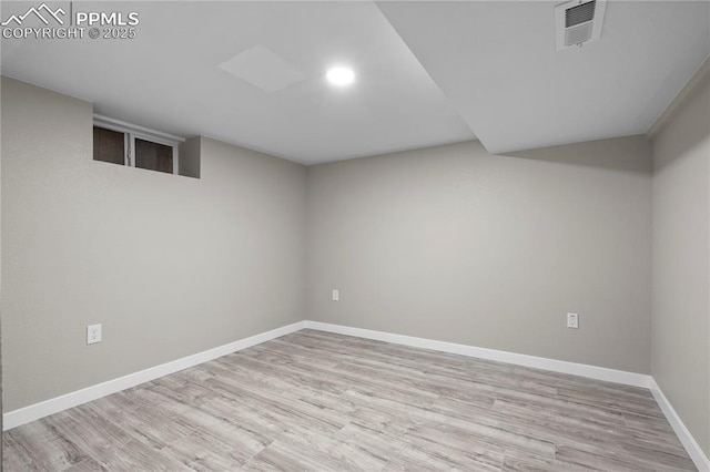 1205 Catalpa St, Pueblo, CO 81001 - finished below grade area featuring wood finished floors, baseboards, and recessed lighting