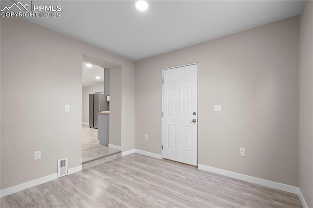 1205 Catalpa St, Pueblo, CO 81001 - spare room with recessed lighting, light wood-style floors, and baseboards