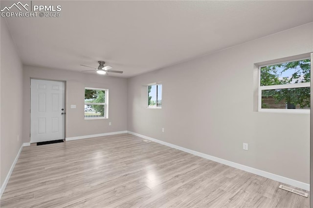 1205 Catalpa St, Pueblo, CO 81001 - empty room with ceiling fan, light wood finished floors, and baseboards