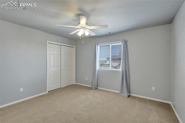 12213 Crystal Downs Rd, Peyton, CO 80831 - unfurnished bedroom featuring light colored carpet, a closet, and baseboards