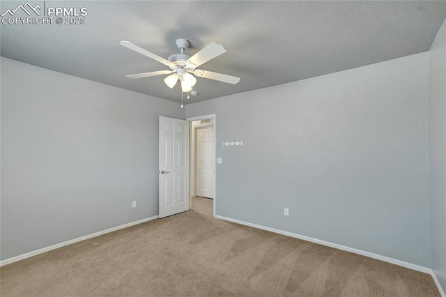 12213 Crystal Downs Rd, Peyton, CO 80831 - empty room featuring carpet, baseboards, and a ceiling fan
