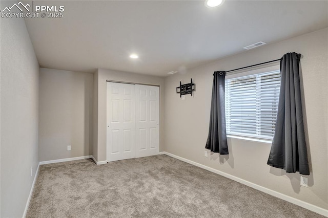 12213 Crystal Downs Rd, Peyton, CO 80831 - unfurnished bedroom with a closet, carpet flooring, baseboards, and recessed lighting