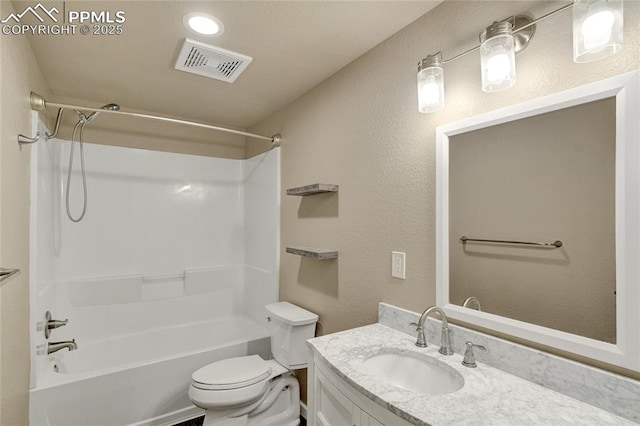 12213 Crystal Downs Rd, Peyton, CO 80831 - full bathroom with vanity, bathtub / shower combination, toilet, and a textured wall