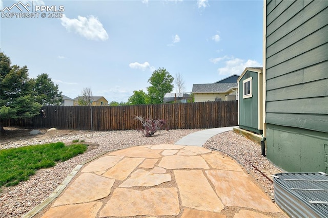 12213 Crystal Downs Rd, Peyton, CO 80831 - fenced backyard featuring a patio