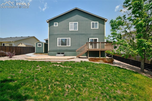 12213 Crystal Downs Rd, Peyton, CO 80831 - rear view of property featuring a wooden deck and a patio