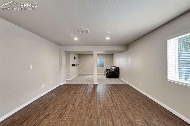 12213 Crystal Downs Rd, Peyton, CO 80831 - spare room featuring dark wood-type flooring, baseboards, and recessed lighting